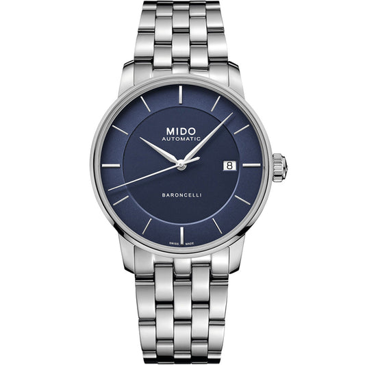 The MIDO Baroncelli II Signature Gent Automatic 39mm Watch features a silver case, blue dial, silver hands and markers, date window at 3 o’clock, and a metal link bracelet for a sleek, modern look.