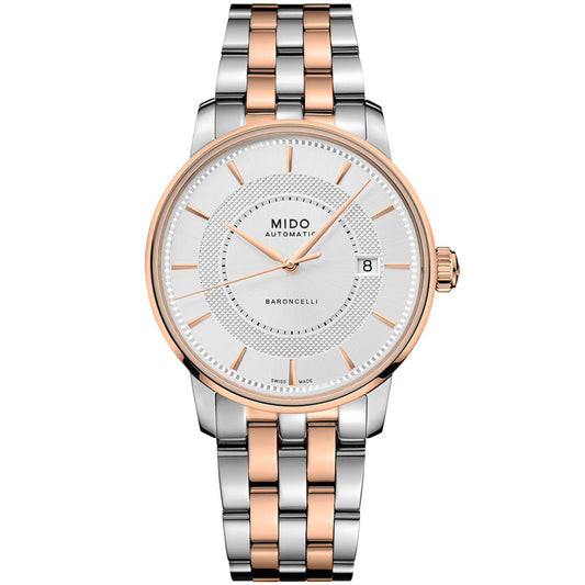 The MIDO Baroncelli II Signature Gent Automatic 39mm Watch features a silver and rose gold metal strap, white dial, gold hour markers and hands, date window at 3 o’clock, and a Nivachron balance-spring for precision performance.