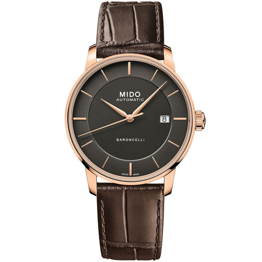 The MIDO Baroncelli II Signature Gent Automatic 39mm watch features a round brown dial, gold case, date at 3 o’clock, and a brown crocodile-pattern leather strap.