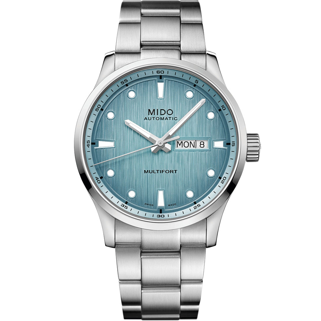 The MIDO Multifort M (Freeze) Automatic 42mm Watch features a blue textured dial, silver hour markers and hands, Caliber 80 movement, day-date display at 3 o'clock, and a metal link bracelet.