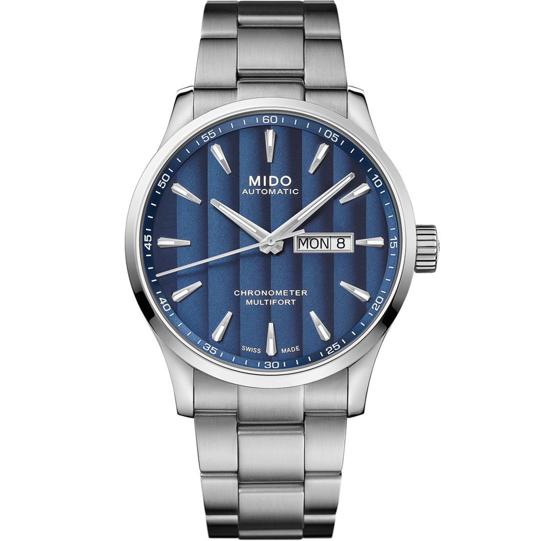The MIDO Multifort Chronometer 1 Automatic 42mm Watch features a blue patterned dial, silver hour markers, day-date display set to Monday the 8th, stainless steel bracelet, and advanced silicon technology.