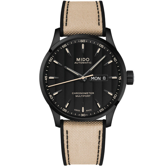 The MIDO Multifort Chronometer 1 Automatic 42mm Watch features a black dial, luminous hands and markers, day-date display, black case, beige fabric strap with black stitching, and is powered by the precise Caliber 80 automatic movement.
