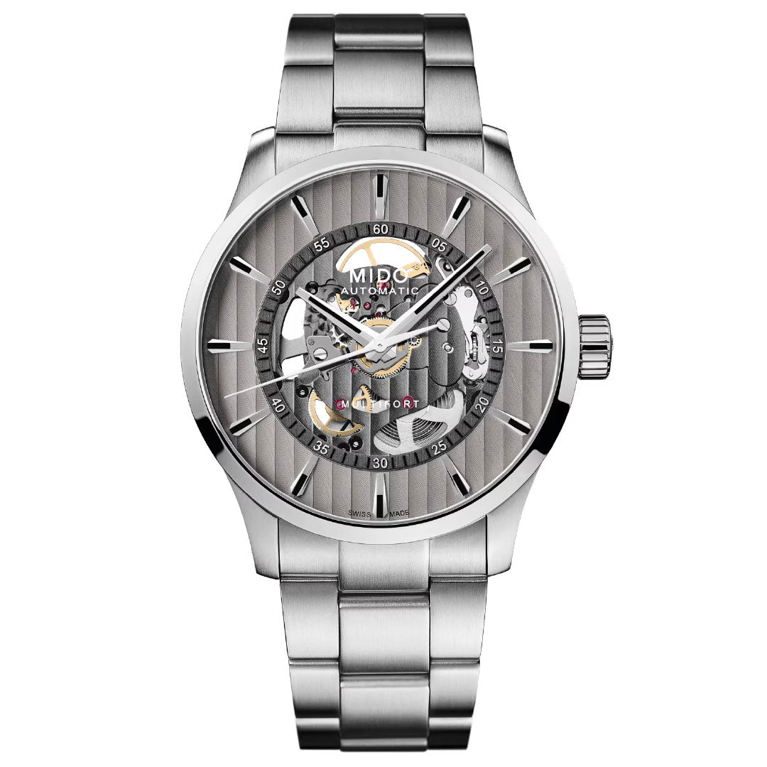 The MIDO Multifort Skeleton Vertigo Automatic 42mm Watch features a stainless steel bracelet, skeleton dial with vertical stripes, and is powered by the Caliber 80 movement for precision.