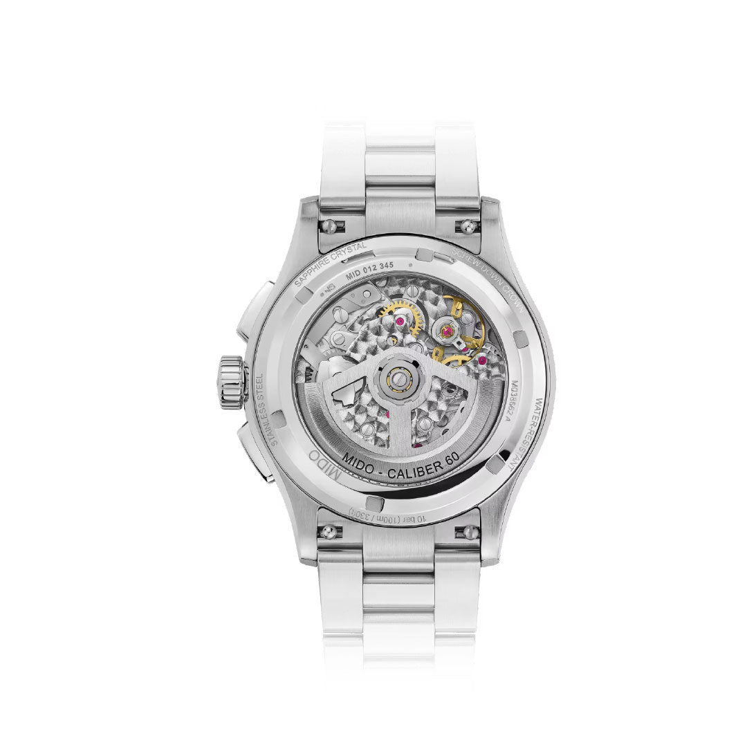 The MIDO Multifort Skeleton Chronograph Automatic 43mm Watch features a see-through case back, showcasing its intricate mechanical movement and "MIDO - CALIBER 60" with model details engraved along the edge.