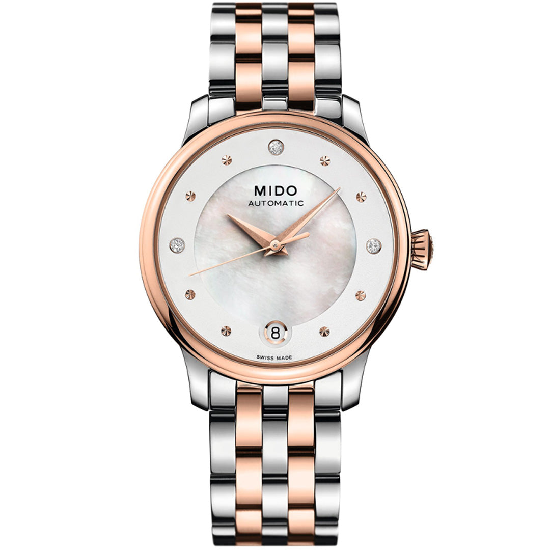 The MIDO Baroncelli II Lady Day Automatic 33mm features Swiss automatic movement, a silver and rose gold two-tone band, white mother-of-pearl dial with diamond markers, and a date display at 6 o’clock.