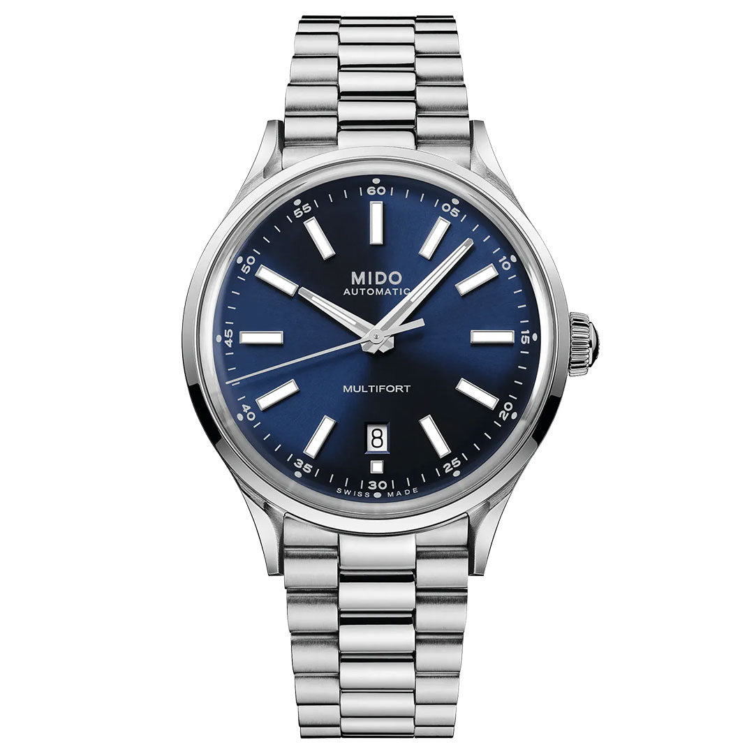 The MIDO Multifort Patrimony Powerwind Automatic 40mm Watch features a stainless steel case, blue dial, silver markers, date window at 6 o’clock, and a sleek metal link bracelet, with MIDO branding on the face.