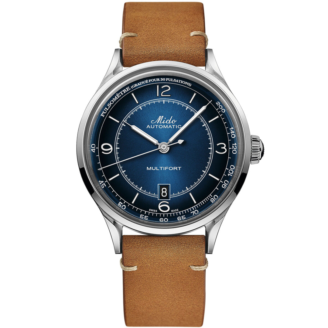 The MIDO Multifort Patrimony Automatic 40mm Watch features a blue dial, silver case, tan leather strap, white hour markers, minute track, pulsometer scale, and the Caliber 80 automatic movement.
