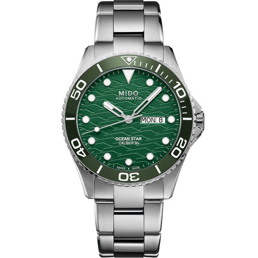 The MIDO Ocean Star 200C Automatic 42.5mm Watch features a silver stainless steel case, green ceramic bezel, green textured dial, round hour markers, and a day-date display at 3 o’clock.