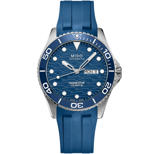 The MIDO Ocean Star 200C Automatic 42.5mm Watch features a blue wave-patterned dial, white hour markers, ceramic bezel, day-date display, and a blue rubber strap.