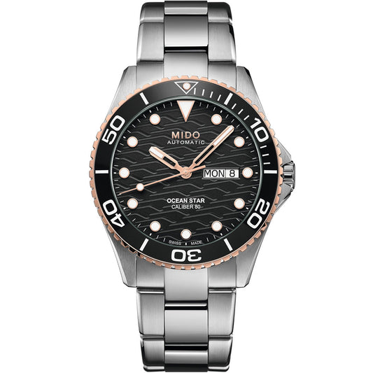The MIDO Ocean Star 200C Automatic 42.5mm Watch features a stainless steel case, black wave-pattern dial with luminous markers, day/date display, and a black & rose gold rotating bezel. This Swiss diving watch is water-resistant.