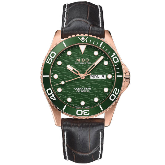 The MIDO Ocean Star 200C Automatic 42.5mm Watch features a green dial, ceramic bezel, rose gold case, black leather strap, and displays day/date with white hour markers and hands.