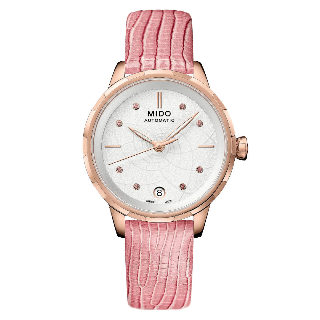 The MIDO Rainflower Automatic 34mm Watch for women features a rose gold case, white dial with pink gemstone markers, date at 6 o'clock, and a textured pink leather strap.