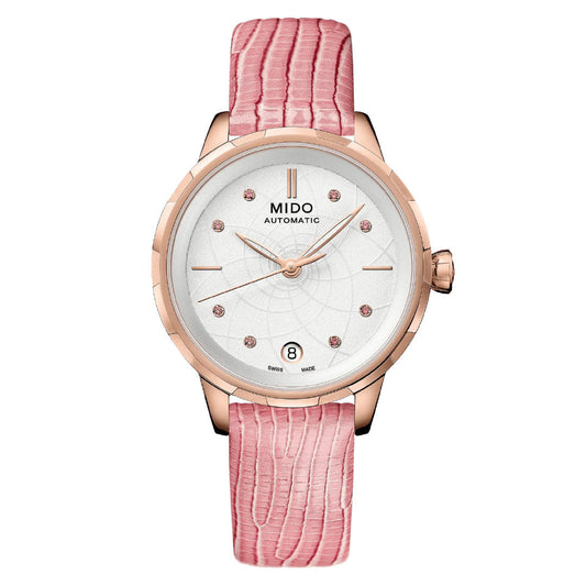 The MIDO Rainflower Automatic 34mm Watch for women features a rose gold case, white dial with pink gemstone markers, date at 6 o'clock, and a textured pink leather strap.