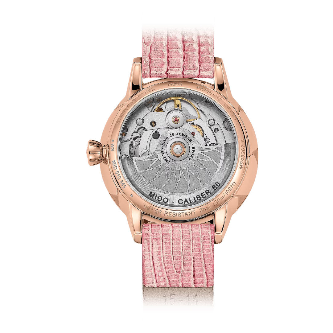 Back view of the MIDO Rainflower Automatic 34mm Watch by MIDO, showing a pink textured strap, rose gold case, and exposed automatic movement with "MIDO CALIBER 80" engraved on the mechanism.