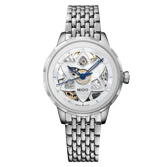 The MIDO Rainflower Blossom Automatic 34mm watch features a skeleton dial with silver and white tones, blue and gold-accented hands and mechanisms, visible intricate gears, and a metal link band.
