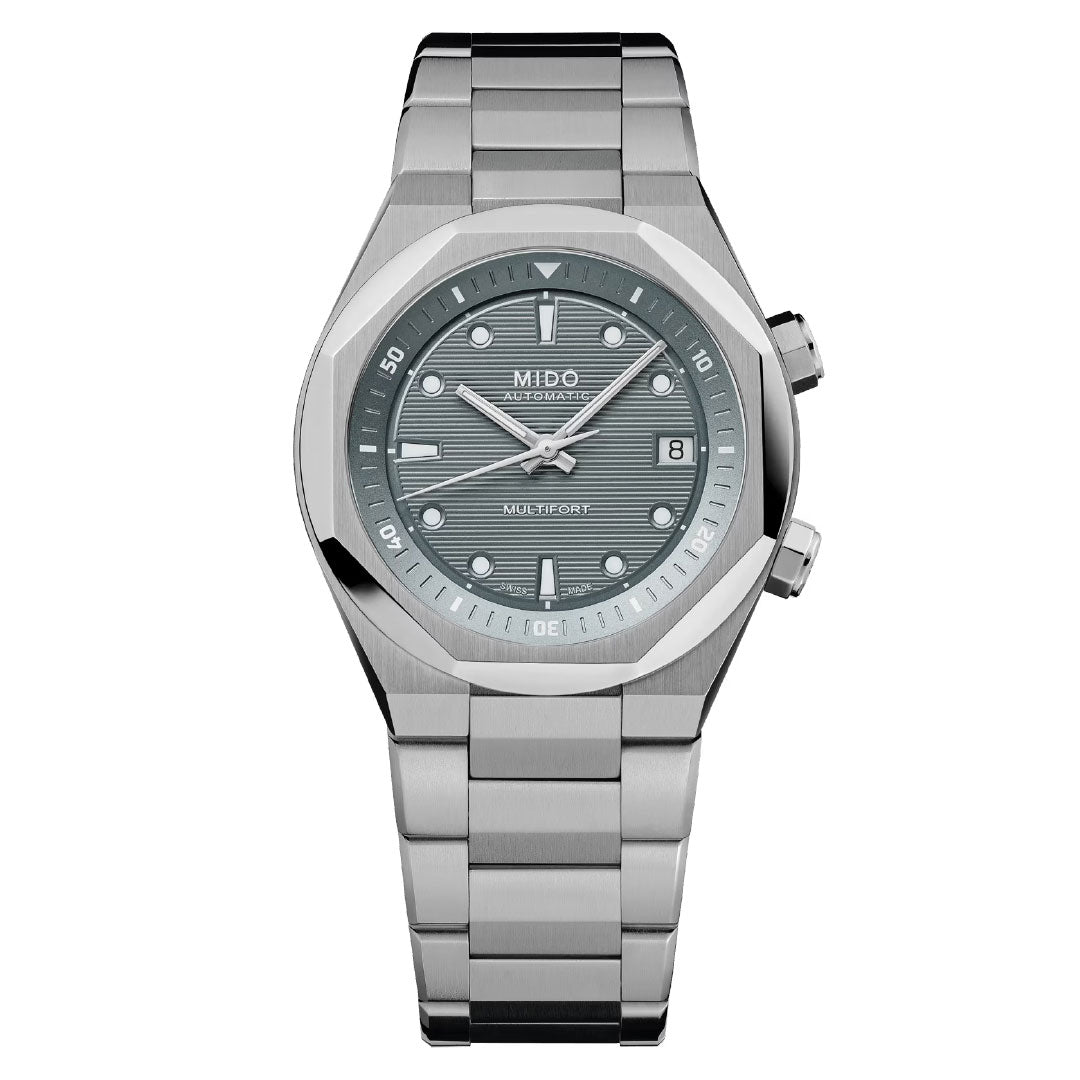 The MIDO Multifort 8 Two Crowns Automatic 40mm Watch features a stainless steel case, grey textured dial, Calibre 72 movement, date at 3 o’clock, dual crowns, and a modern metal bracelet.