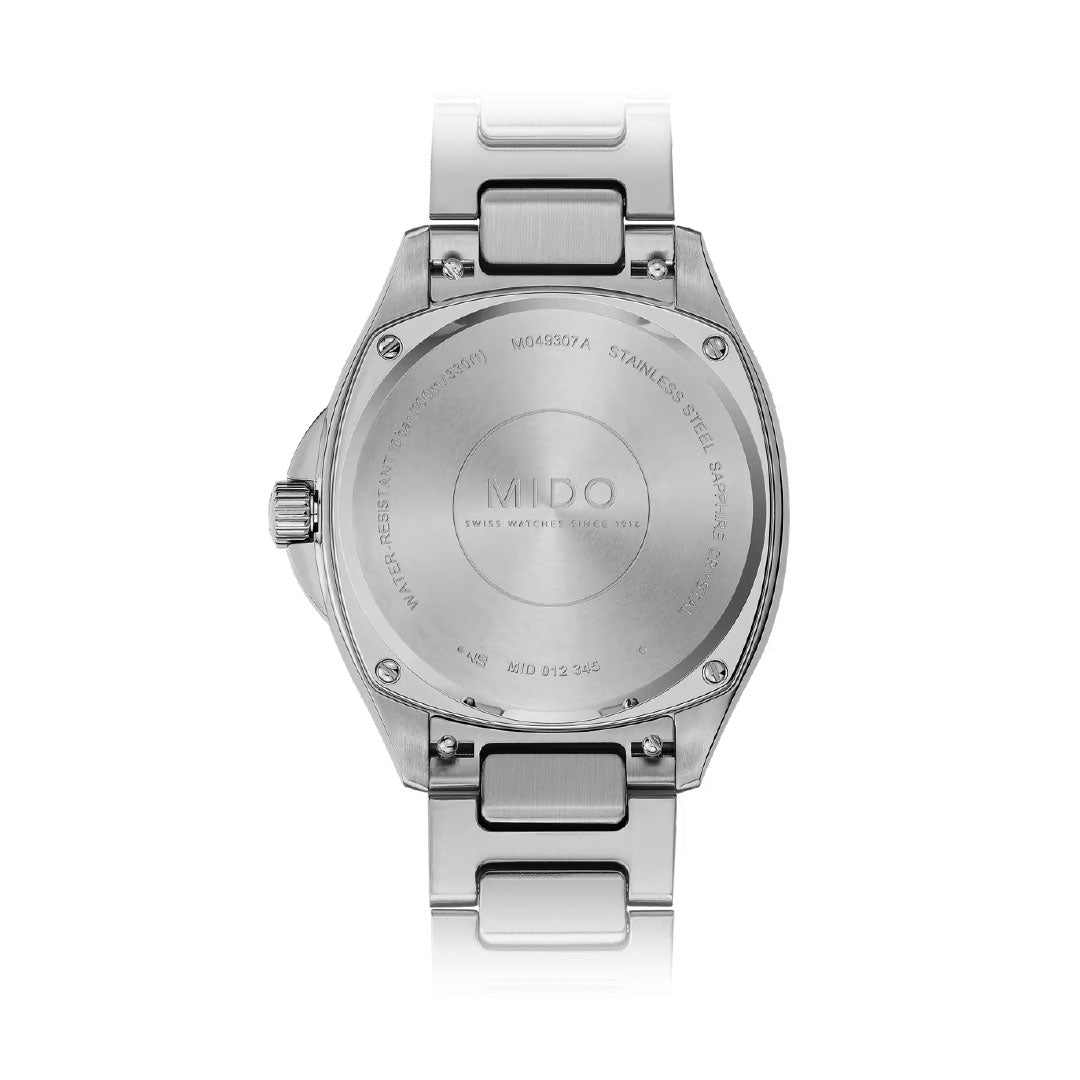 The image shows the back of a MIDO Multifort TV 35 Automatic 35mm Watch with engraved details and a metal bracelet, featuring the MIDO brand name, model info, and its automatic movement on the stainless steel case back.