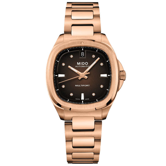The MIDO Multifort TV 35 Automatic 35mm Watch features a rose gold case, round black dial with diamond markers, Nivachron balance spring, date display at 12 o’clock, and a metal link bracelet.