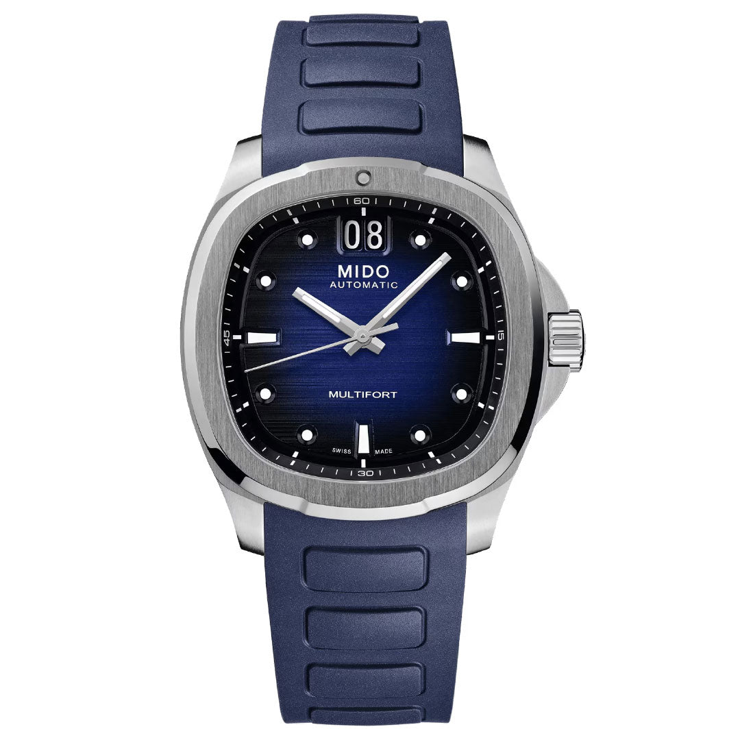 The MIDO Multifort TV Big Date Automatic 40mm Watch features an automatic movement, blue dial, silver bezel, blue rubber strap, big date display at 12 o'clock, plus luminescent hands and hour markers for visibility in any light.