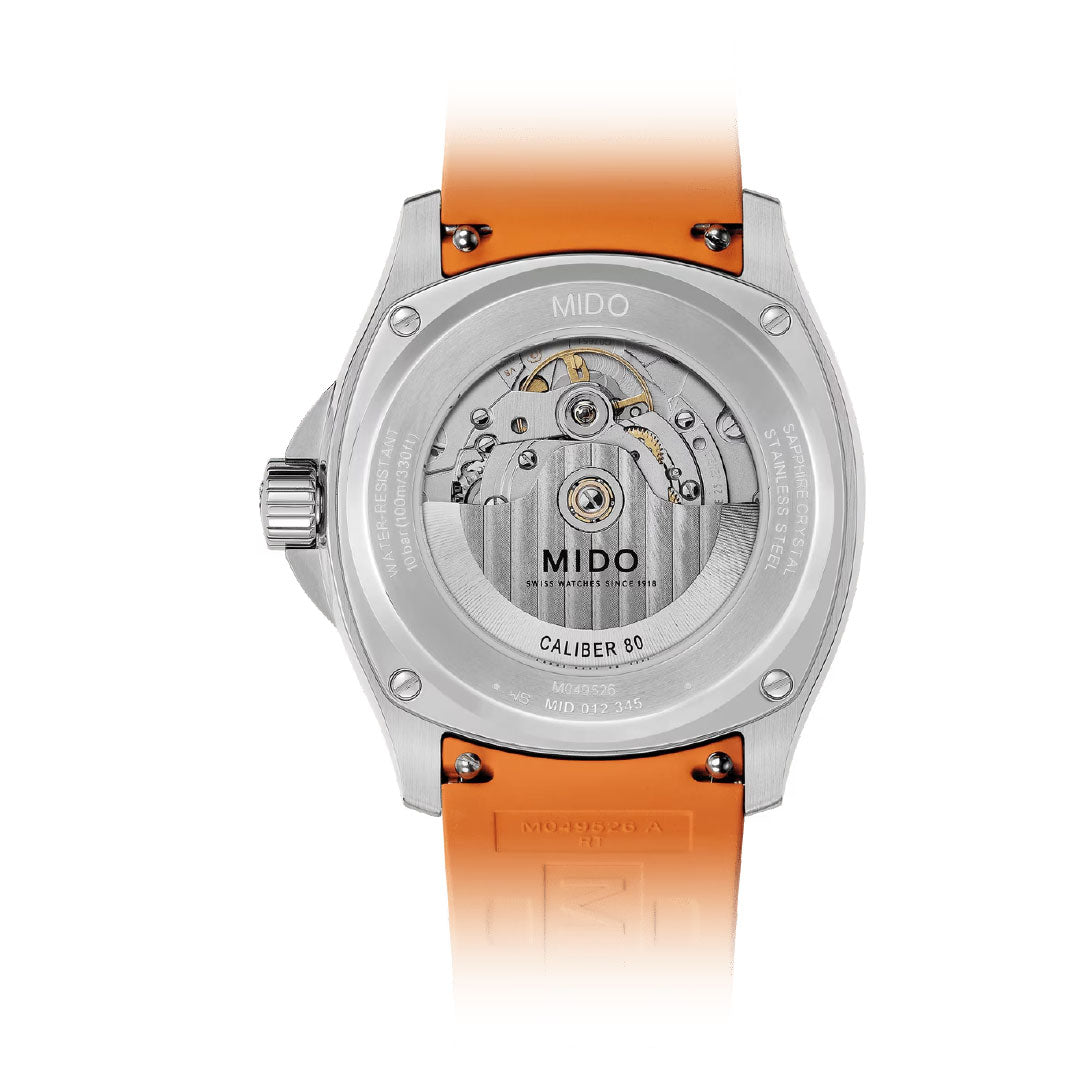The MIDO Multifort TV Big Date Automatic 40mm Watch features an orange strap and a transparent case back that reveals its Caliber 80 automatic movement.
