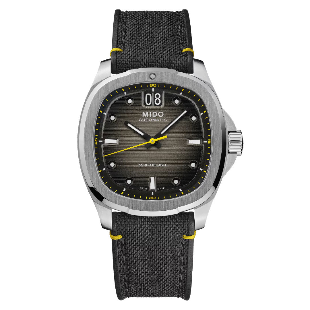 The MIDO Multifort TV Big Date Automatic 40mm watch features a black textured dial, silver markers, large date at 12 o’clock, and a black strap with yellow stitching.