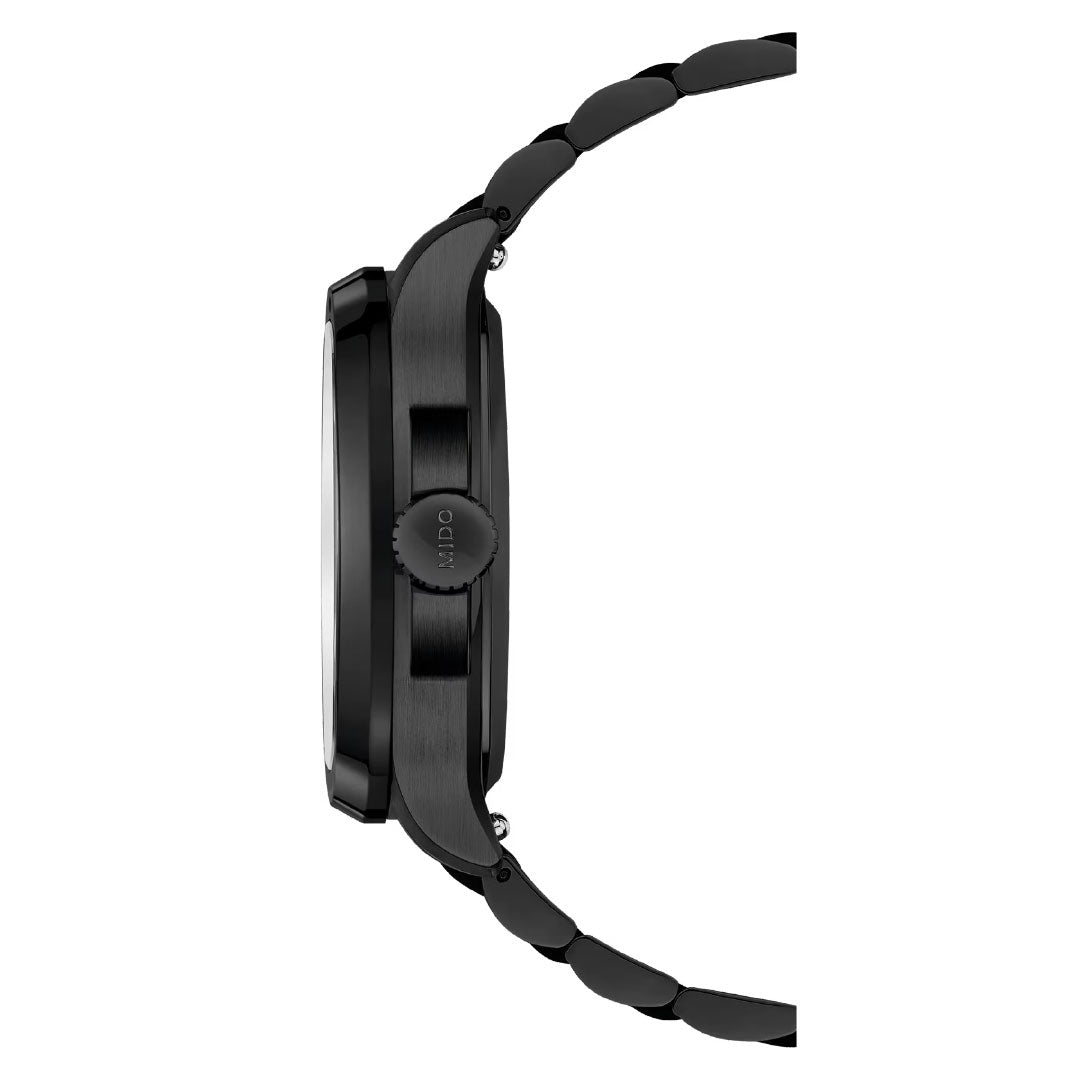 Side view of the MIDO Multifort TV Big Date Automatic 40mm Watch in black, featuring a round case, flat bezel, textured side crown, and part of the metal linked bracelet.