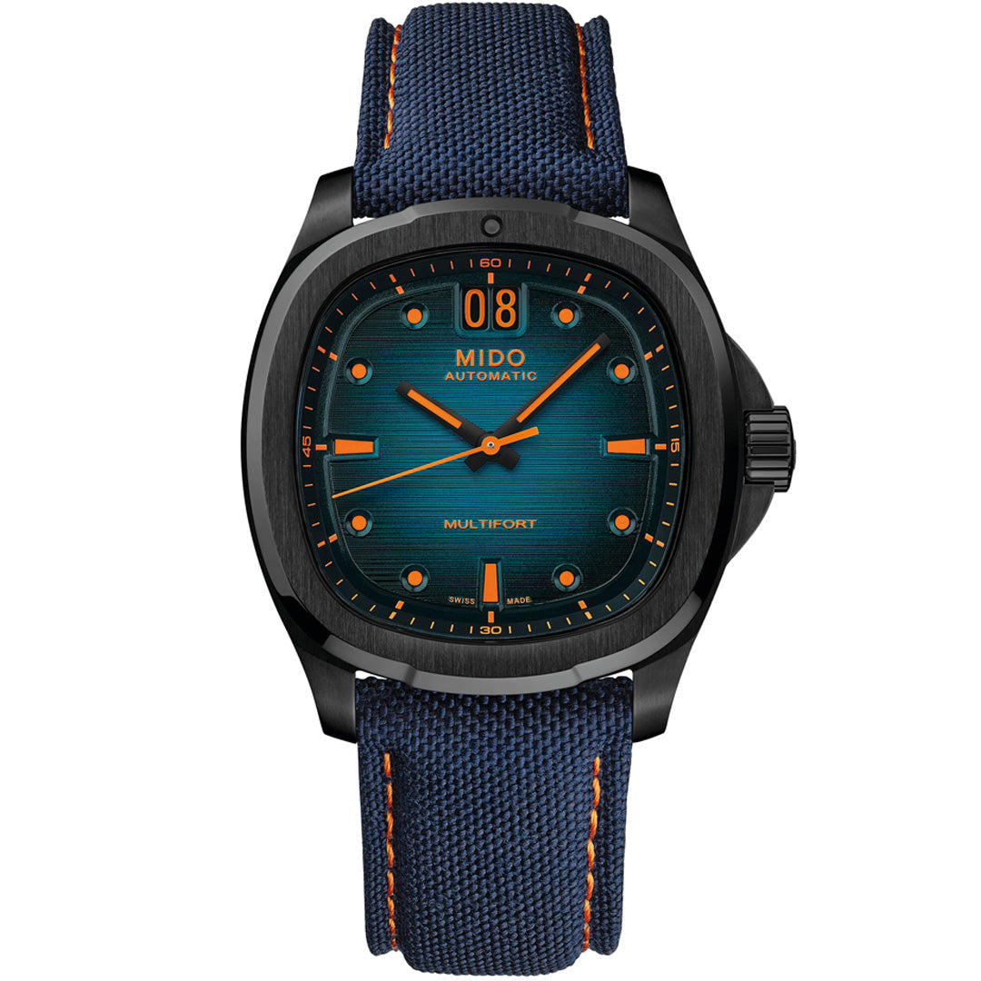 The MIDO Multifort TV Big Date Automatic 40mm Watch showcases Swiss automatic movement, a blue textured dial with orange details, black case, and blue fabric strap with orange stitching. It displays time and features an oversized “08” BIG DATE at the top.
