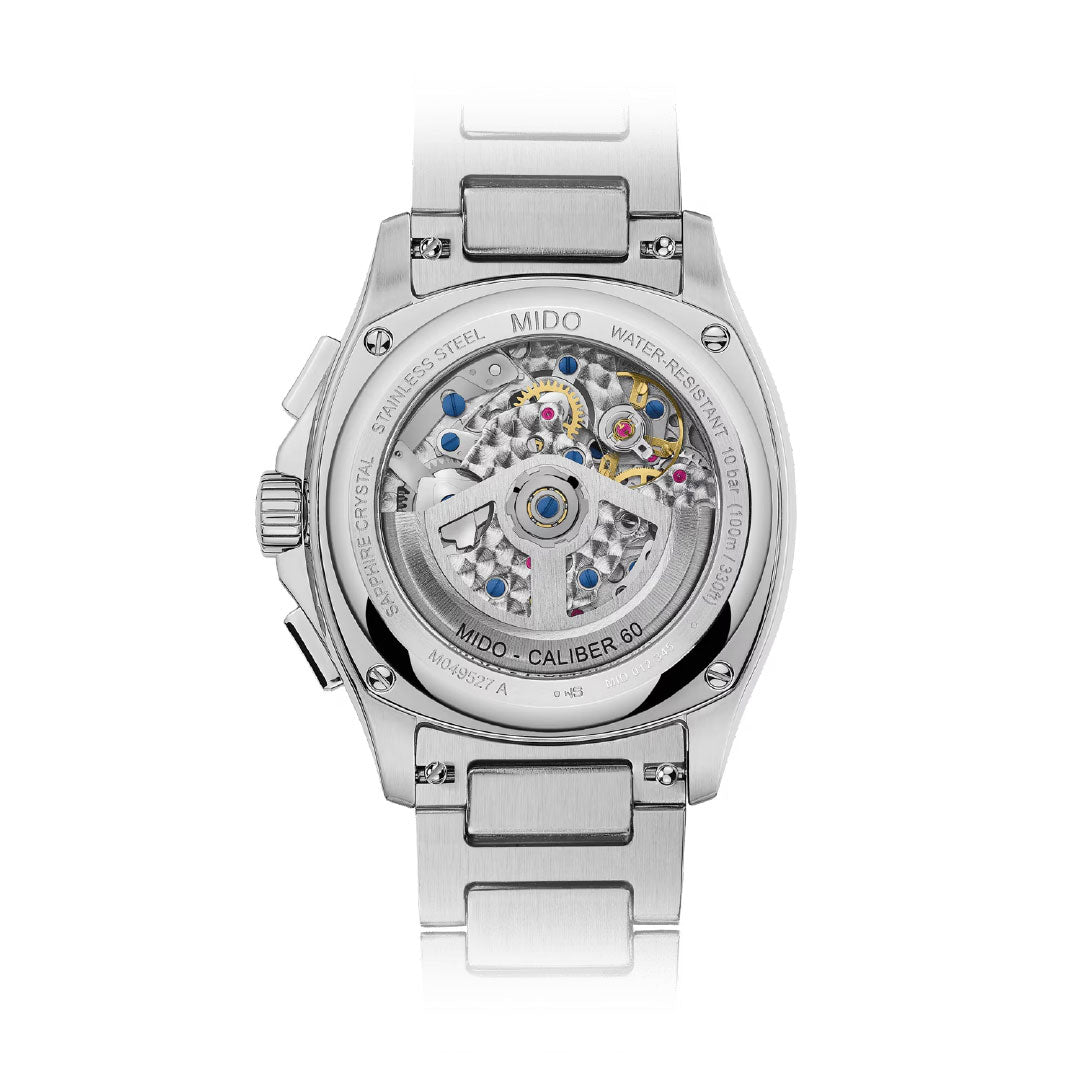 The back of the MIDO Multifort TV Chronograph Automatic 42mm reveals its Swiss automatic movement, displaying intricate gears and jewels through the engraved stainless steel case and bracelet.