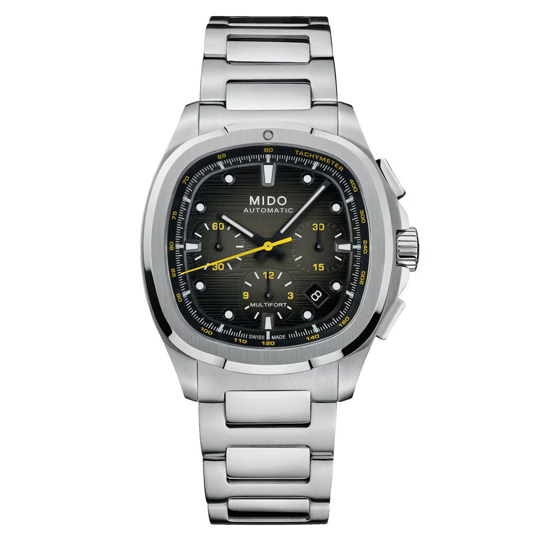 The MIDO Multifort TV Chronograph Automatic 42mm features a stainless steel band, black textured dial with yellow accents, chronograph subdials, date at 4 o’clock, and a distinctive TV-shaped case for a modern sporty look.