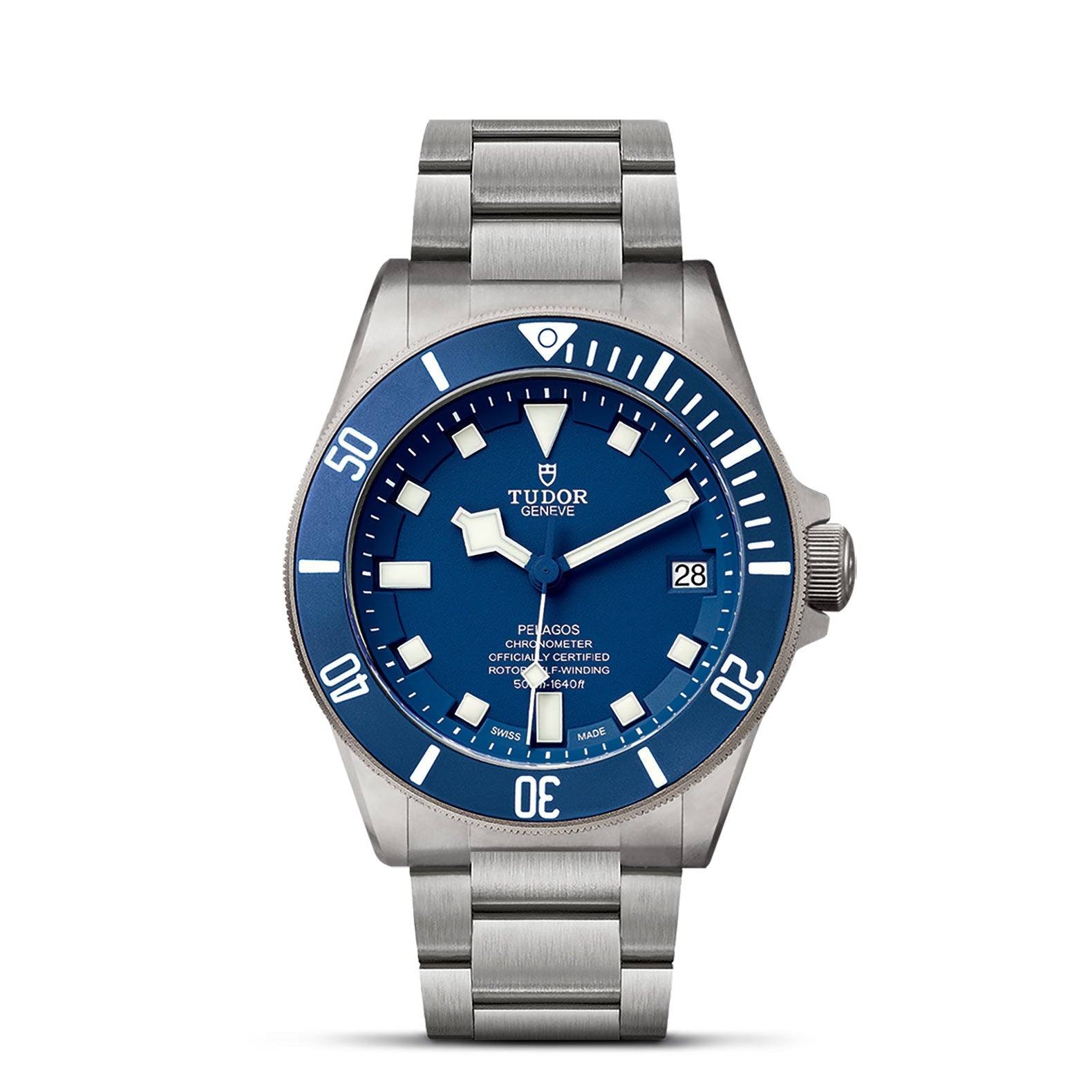 The TUDOR Pelagos is a silver divers' watch featuring a blue face with a rotating bezel, luminous hour markers, and a date window at the 3 o'clock position. This waterproof watch includes a metal bracelet secured by a fold-over clasp.