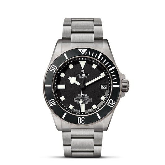 Introducing the TUDOR Pelagos, a sophisticated watch with a sleek silver frame and black dial. This timepiece features white hour markers and hands, complemented by the brand name and a convenient date display at the 3 o'clock position. It comes with a durable titanium bracelet, making it perfect for enthusiasts of divers' watches due to its impressive waterproof capability up to 500 meters.
