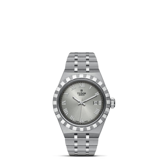 The TUDOR Royal watch from TUDOR is adorned with a stainless steel and gold bracelet. Its dial, set against a plain white background, features Roman numerals, a date window at 3 o'clock, and the Tudor logo. Complemented by a fluted bezel, this automatic sport-chic timepiece exudes a sleek, modern design.