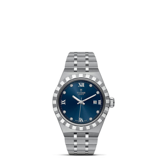 The TUDOR Royal from TUDOR is a stylish silver automatic sports watch, showcasing a blue dial adorned with Roman numerals and diamond hour markers. It features a date window at the 3 o'clock position, paired with a stainless steel bracelet and a notched bezel for unique design flair.