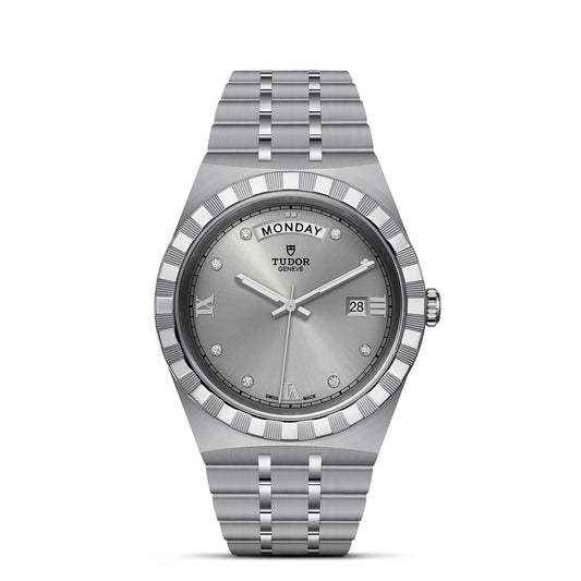 The TUDOR Royal wristwatch exemplifies the perfect blend of automatic sport-chic elegance. It showcases a silver stainless steel bracelet accented with glints of gold, a grey round dial complete with day and date display, diamond hour markers, and a fluted bezel. The iconic TUDOR brand logo is prominently positioned at 12 o'clock.
