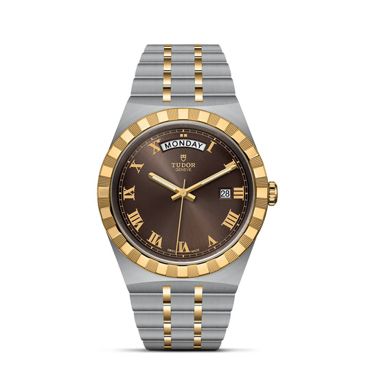 The TUDOR Royal, by the esteemed brand TUDOR, showcases a stainless steel and gold bracelet. Its brown dial is adorned with gold Roman numerals and includes a date window, exuding sport-chic elegance. The brand's name is prominently featured on the dial.