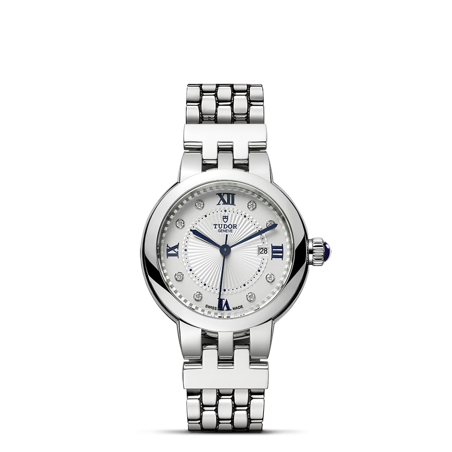 The TUDOR Clair de Rose from TUDOR is a silver wristwatch featuring a polished steel bracelet and a round white opaline dial. It showcases Roman numerals at the 12, 3, 6, and 9 o'clock positions, diamond hour markers, and blue-tipped hands. The watch also includes an elegantly positioned date indicator at the 3 o'clock mark.