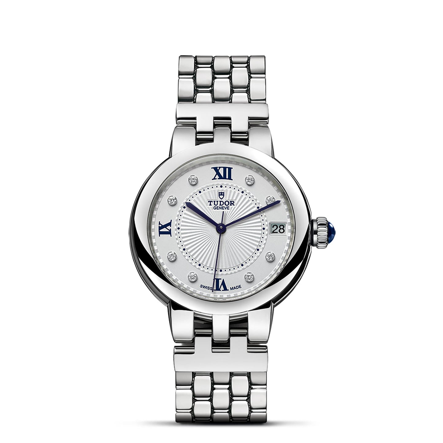 The TUDOR Clair de Rose wristwatch showcases a sophisticated silver steel case with a white opaline dial. The dial is adorned with blue Roman numerals at 3, 6, 9, and 12, diamond hour markers, and a date window at the 3 o'clock position. Its polished link bracelet enhances its elegant appeal.