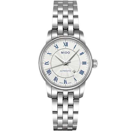 The MIDO Baroncelli II Lady Automatic 29mm Watch features a silver metal link band, white dial, blue Roman numerals, a date window at 6 o'clock, three hands, and precise automatic movement for timeless elegance.