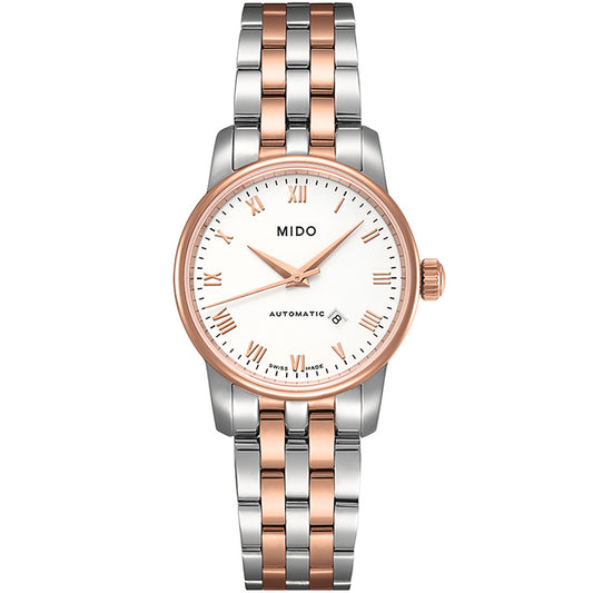 The MIDO Baroncelli II Lady Automatic 29mm Watch features a white dial, rose gold and silver two-tone metal band, Roman numeral hour markers, automatic movement, and a date display at 6 o’clock.