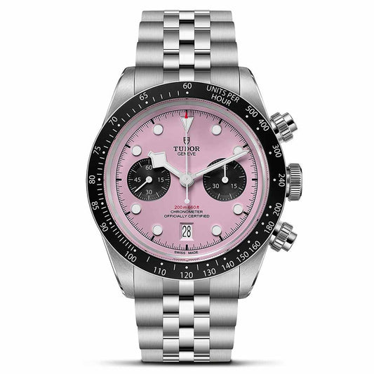 The TUDOR Black Bay Chrono features a steel case, pink dial with black subdials, black tachymeter bezel, date at 6 o’clock, and a silver link bracelet—a bold new addition to the TUDOR collection.