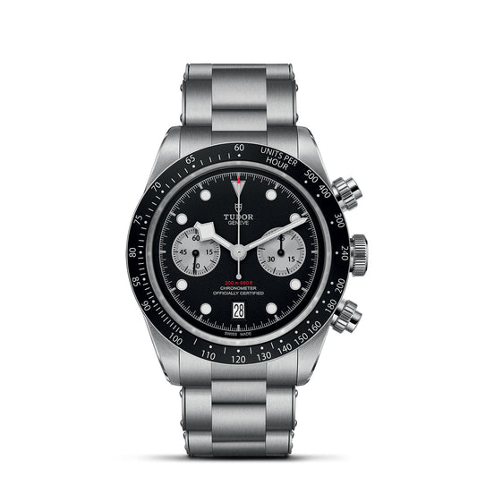 The TUDOR Black Bay Chrono is a stainless steel chronograph watch that showcases a black dial, silver sub-dials, and a tachymetric scale on the bezel. With three pushers and a metal bracelet, its design encapsulates the precision and style characteristic of TUDOR chronographs.