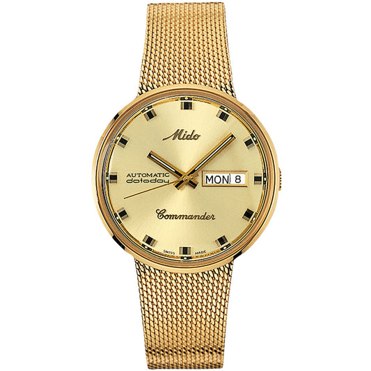 The MIDO Commander 1959 Automatic 37mm features a gold mesh strap, gold dial, black hour markers and hands, plus a day-date window on the right.