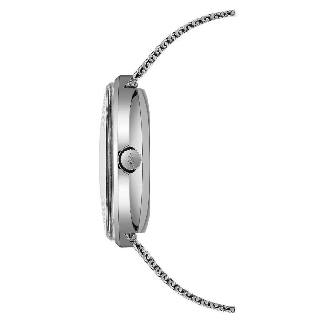Side view of the MIDO Commander Pixel Automatic 37mm Watch showing its round case, flat crown, and thin metal bracelet, displayed vertically against a white background.