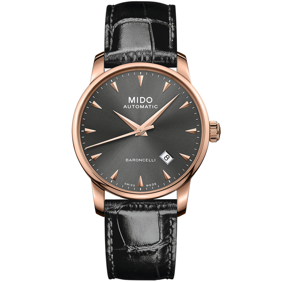 The MIDO Baroncelli II Gent Automatic 38mm Watch features a black leather strap, rose gold case, black dial with rose gold hands and markers, plus a date window at 3 o’clock—a sophisticated Swiss automatic timepiece.