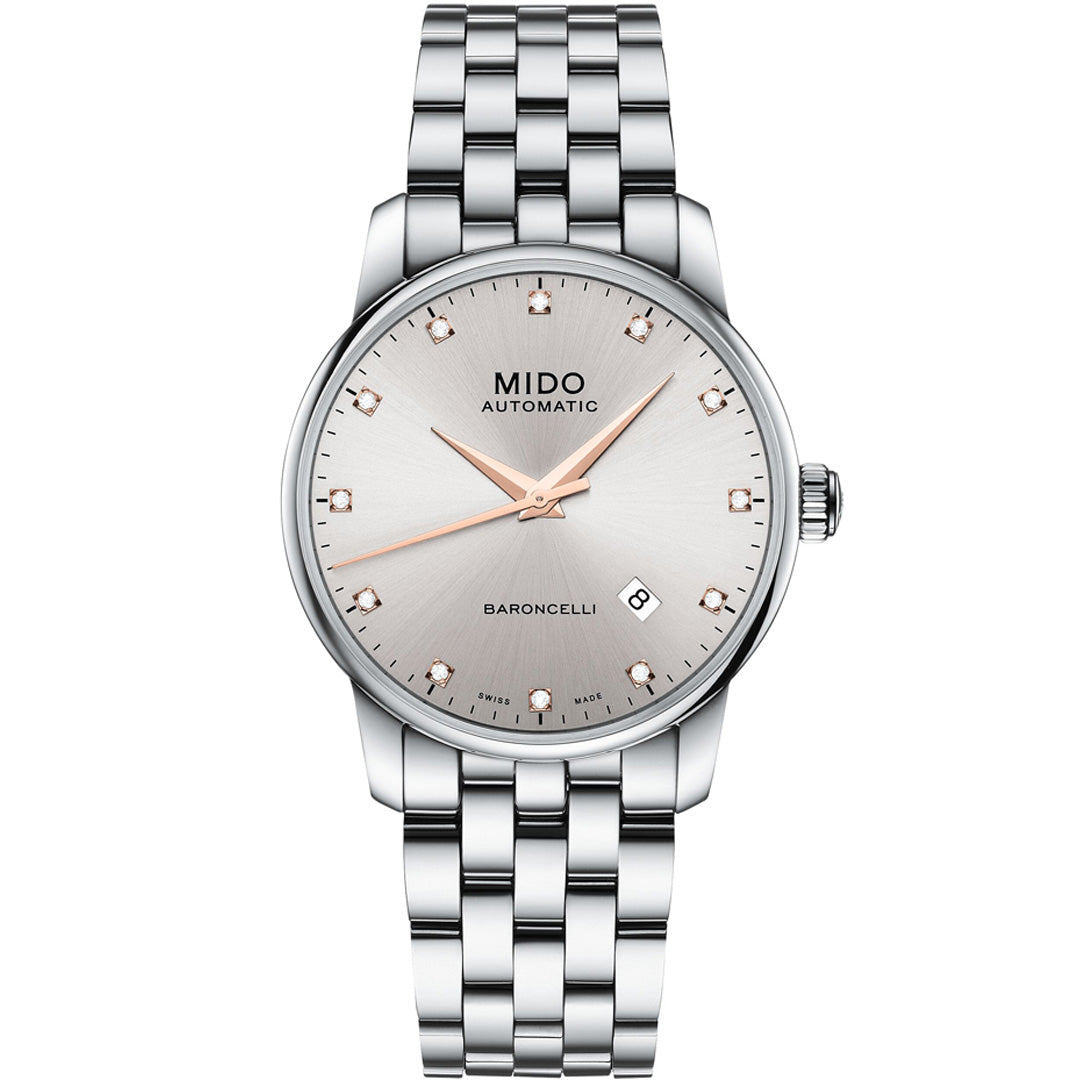 The MIDO Baroncelli II Gent Automatic 38mm Watch combines Swiss precision, a stainless steel band, minimalist light silver dial, rose gold hour markers, three hands, and date at 3 o’clock for timeless elegance.