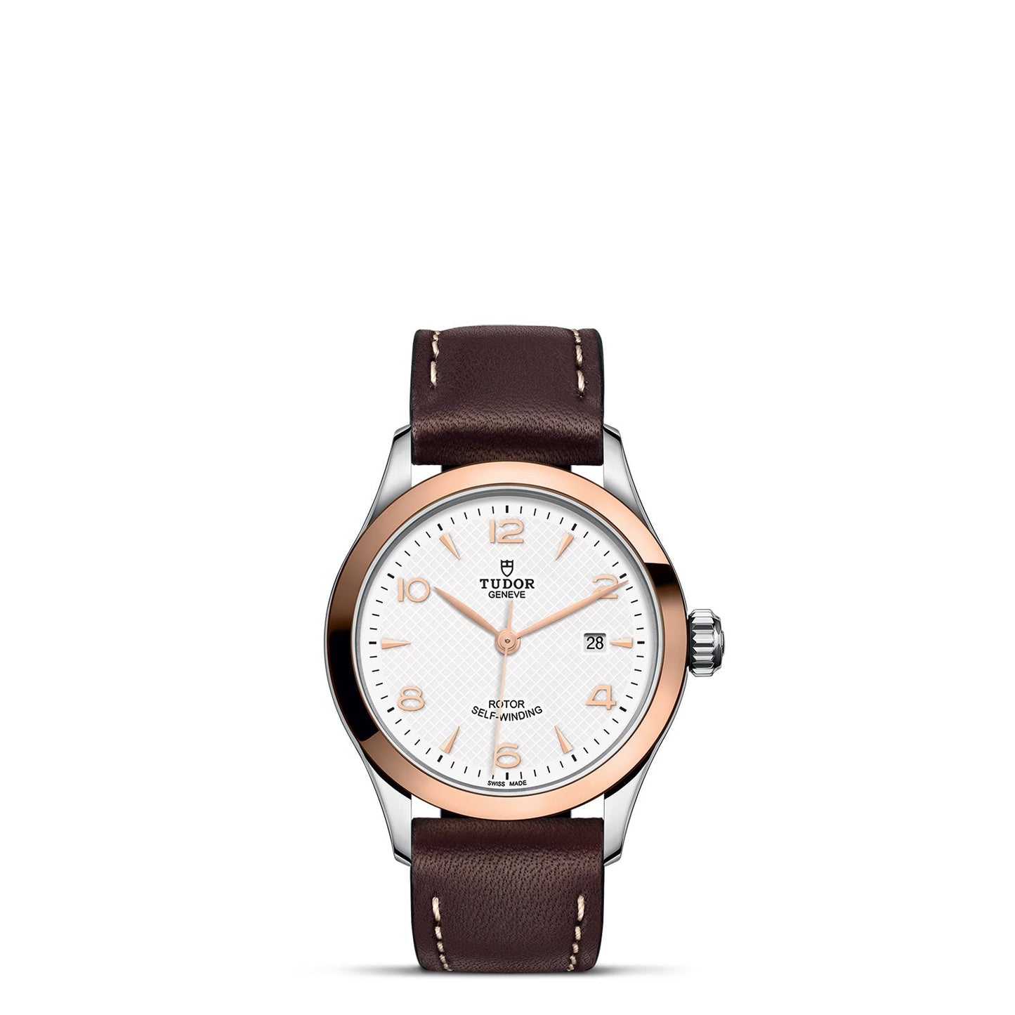 The TUDOR 1926 wristwatch highlights a white dial with rose gold accents and a brown leather strap. Its design includes a date display at the 3 o'clock position, capturing the elegance and precision typical of mechanical watches.