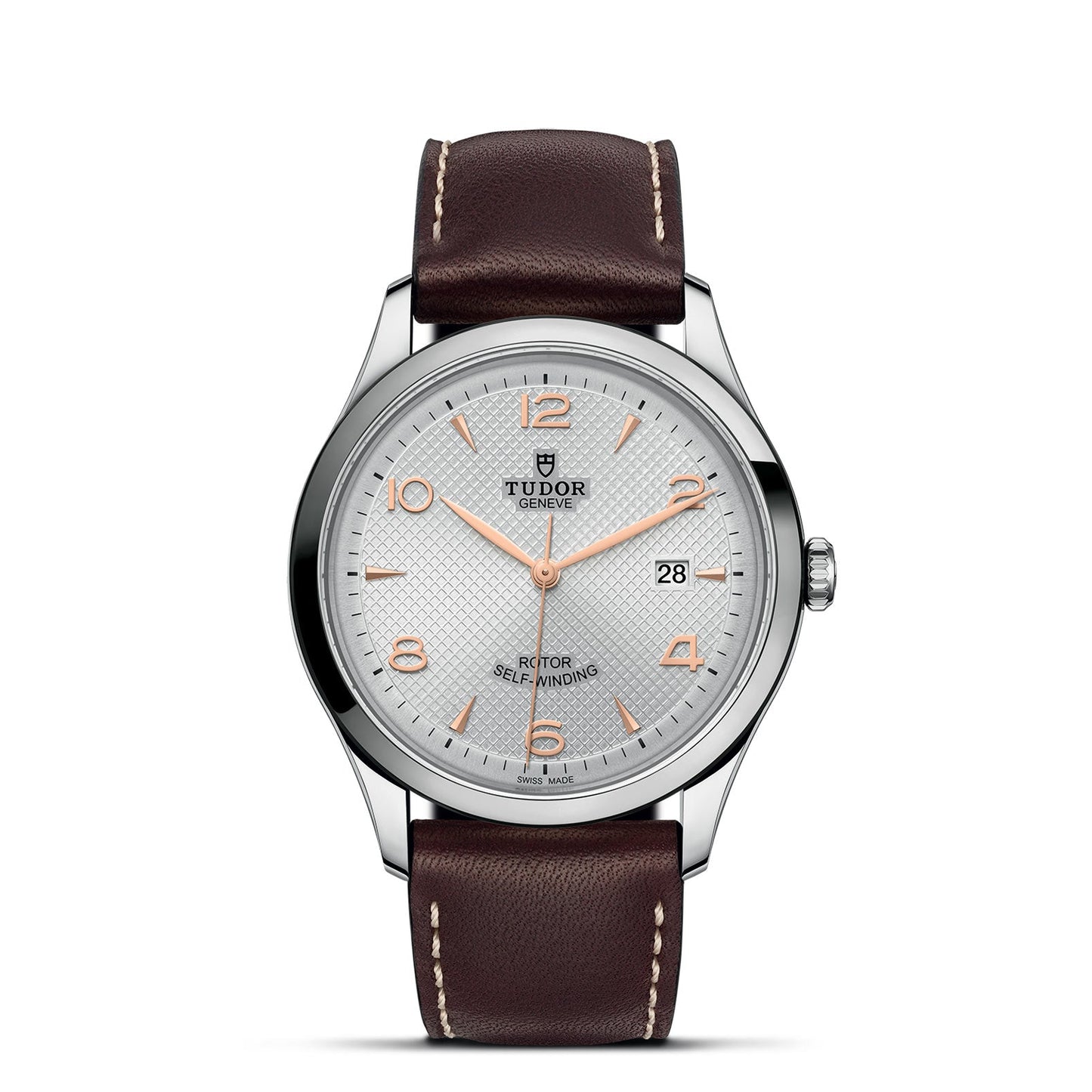 The TUDOR 1926 mechanical watch showcases a stainless steel case paired with a white textured dial. Its elegance is enhanced by silver and rose gold hour markers and a convenient date window positioned at 3 o'clock. It is complemented by a brown leather strap adorned with white stitching, exuding sophistication.