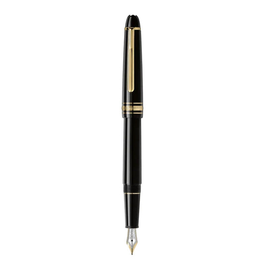 A Montblanc Meisterstuck Black Resin Yellow Gold Plated Fountain Pen is positioned upright against a plain white background, showcasing its sleek black design and gold accents. The cap includes a gold clip, while the pointed gold nib adds to the pen's air of elegance and luxury in writing.