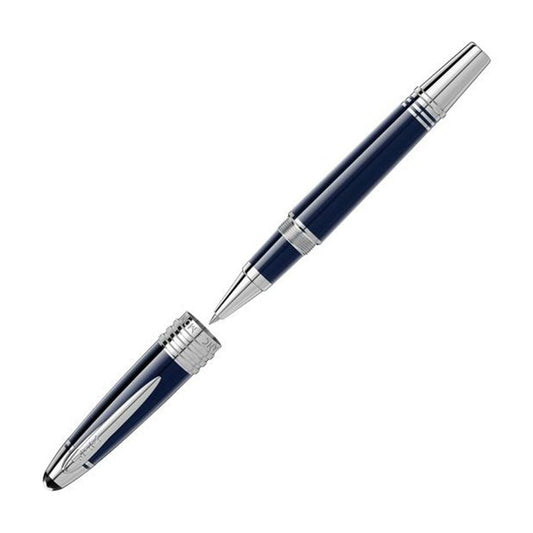 A sleek, navy and platinum rollerball pen with the cap removed lies on a plain white background. This Montblanc JFK Limited Edition piece features a glossy finish, platinum-plated accents, and the iconic Montblanc emblem, reminiscent of elegance akin to John F. Kennedy's timeless style.