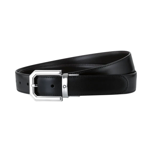 The Montblanc Black Leather Belt, crafted from black leather and adorned with a silver geometric buckle, features adjustable holes for perfect sizing. It is elegantly coiled in a neat loop against a plain white background, highlighting its modern style and functionality.